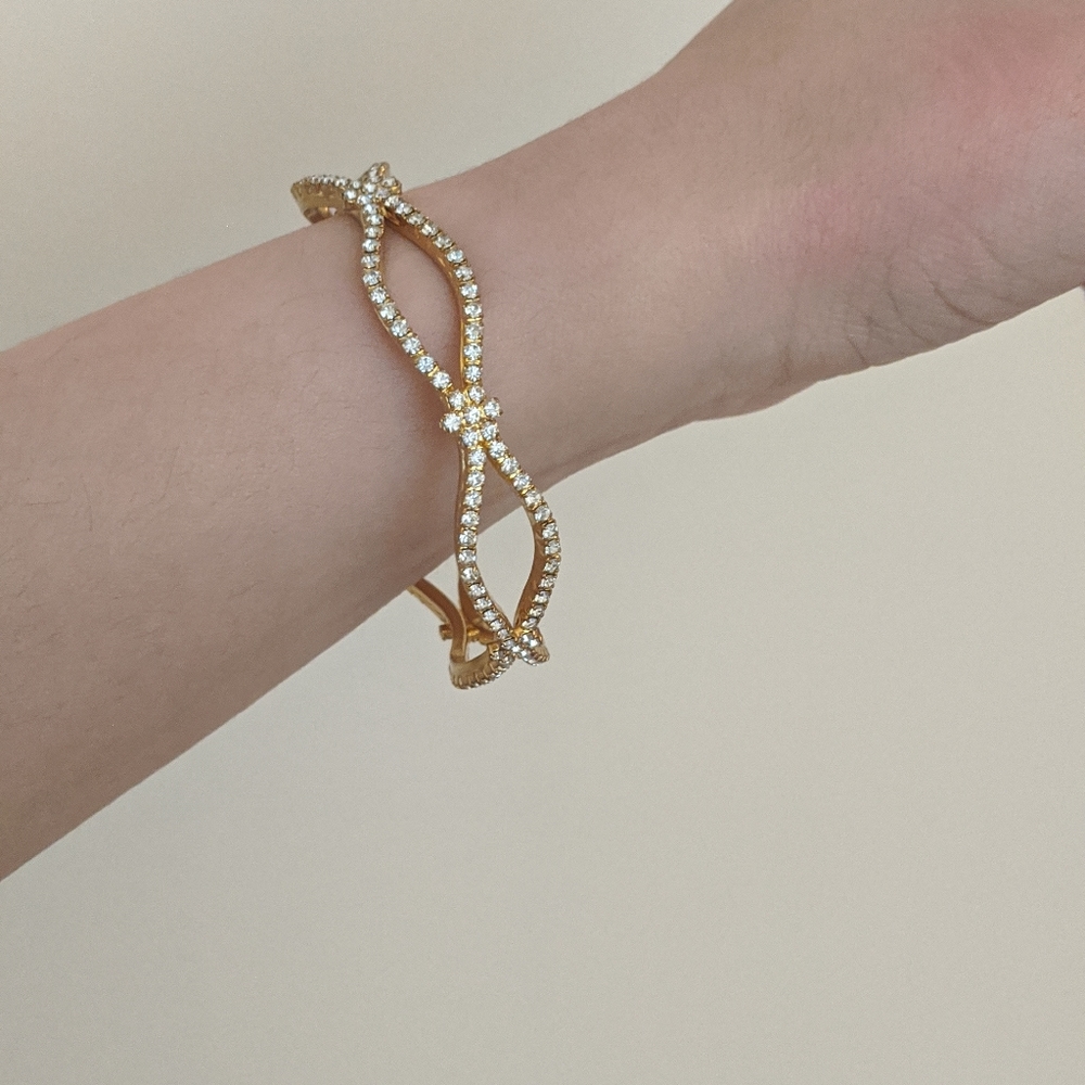 Pretty cz and brass gold plated bangle.